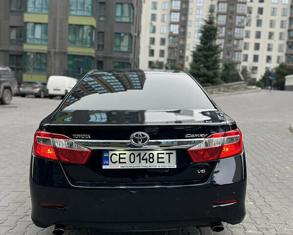 Черный Тойота Камри, объемом двигателя 3.46 л и пробегом 217 тыс. км за 13500 $, фото 12 на Automoto.ua