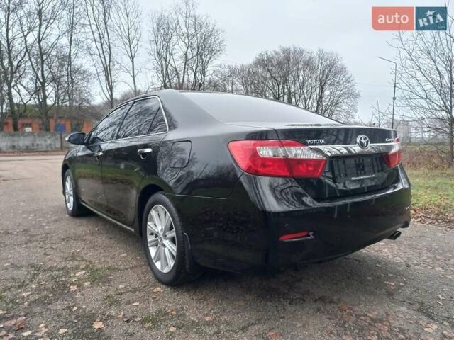 Чорний Тойота Камрі, об'ємом двигуна 2.5 л та пробігом 130 тис. км за 15900 $, фото 5 на Automoto.ua