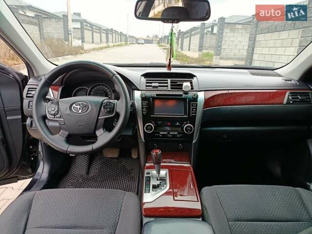 Чорний Тойота Камрі, об'ємом двигуна 2.5 л та пробігом 176 тис. км за 13499 $, фото 15 на Automoto.ua