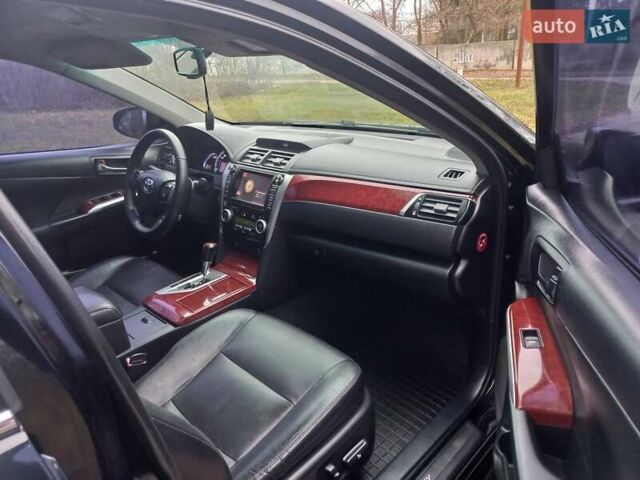 Чорний Тойота Камрі, об'ємом двигуна 2.5 л та пробігом 130 тис. км за 15900 $, фото 3 на Automoto.ua