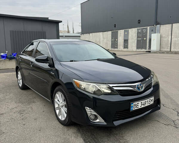 Черный Тойота Камри, объемом двигателя 2.49 л и пробегом 187 тыс. км за 11999 $, фото 1 на Automoto.ua