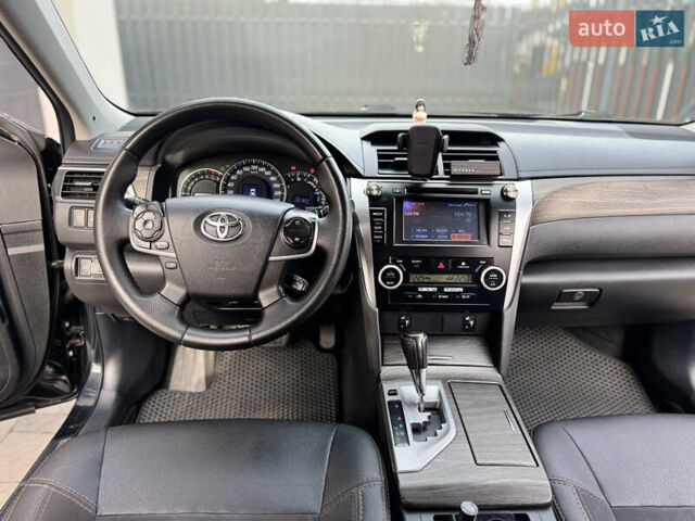 Черный Тойота Камри, объемом двигателя 2.5 л и пробегом 255 тыс. км за 13500 $, фото 23 на Automoto.ua