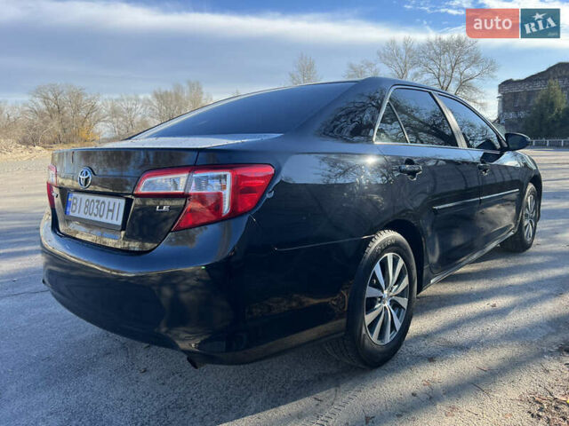 Чорний Тойота Камрі, об'ємом двигуна 2.5 л та пробігом 155 тис. км за 12000 $, фото 2 на Automoto.ua
