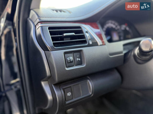 Чорний Тойота Камрі, об'ємом двигуна 2.49 л та пробігом 305 тис. км за 11800 $, фото 12 на Automoto.ua