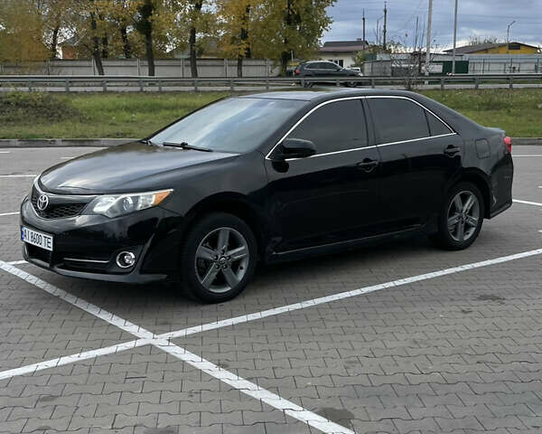 Черный Тойота Камри, объемом двигателя 2.5 л и пробегом 252 тыс. км за 10500 $, фото 4 на Automoto.ua