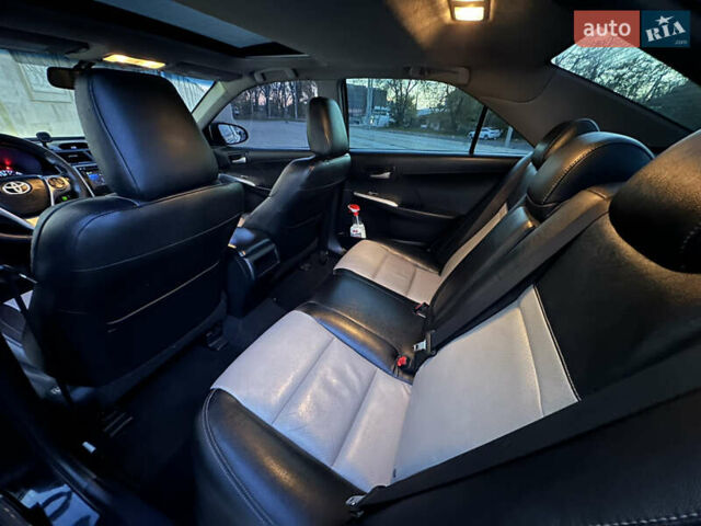 Черный Тойота Камри, объемом двигателя 2.5 л и пробегом 215 тыс. км за 11950 $, фото 27 на Automoto.ua