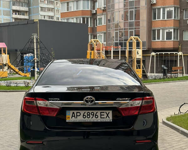 Черный Тойота Камри, объемом двигателя 2.5 л и пробегом 142 тыс. км за 13400 $, фото 4 на Automoto.ua