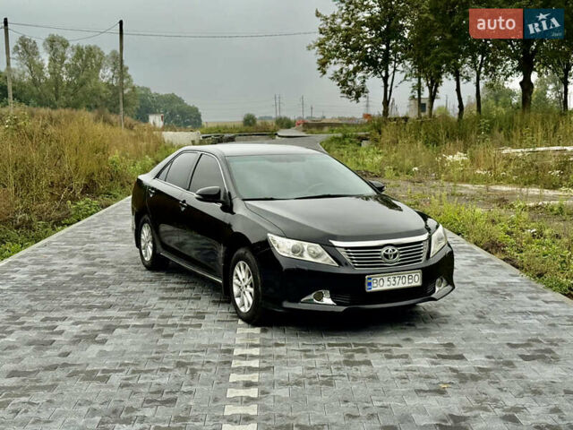 Черный Тойота Камри, объемом двигателя 2.5 л и пробегом 260 тыс. км за 10999 $, фото 4 на Automoto.ua