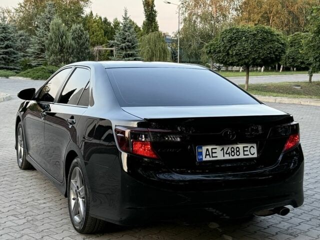 Черный Тойота Камри, объемом двигателя 2.5 л и пробегом 198 тыс. км за 10900 $, фото 5 на Automoto.ua