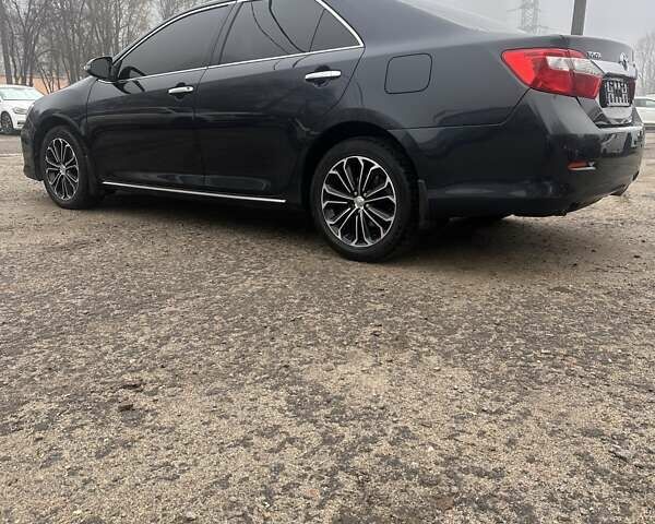Чорний Тойота Камрі, об'ємом двигуна 0 л та пробігом 232 тис. км за 12700 $, фото 3 на Automoto.ua