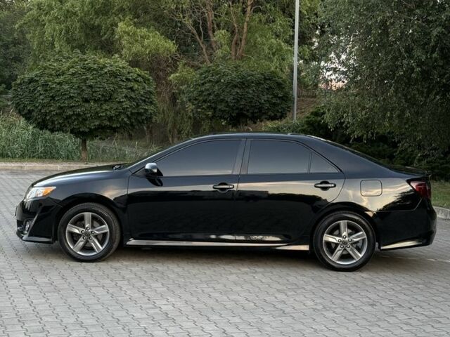 Черный Тойота Камри, объемом двигателя 2.5 л и пробегом 198 тыс. км за 10900 $, фото 3 на Automoto.ua