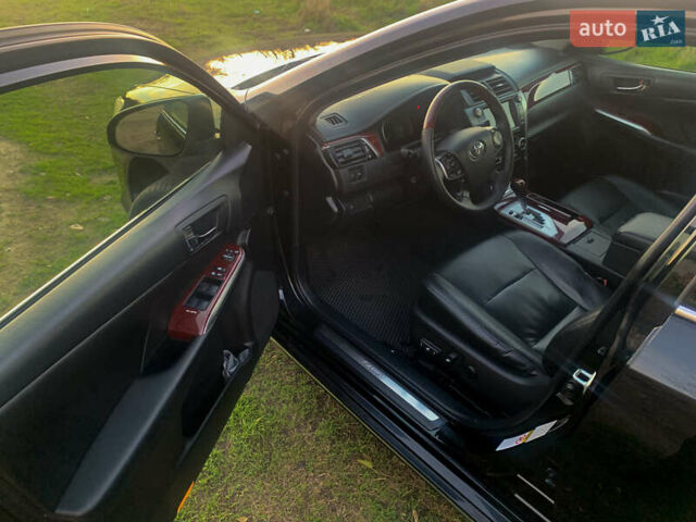 Чорний Тойота Камрі, об'ємом двигуна 2.5 л та пробігом 236 тис. км за 15200 $, фото 13 на Automoto.ua