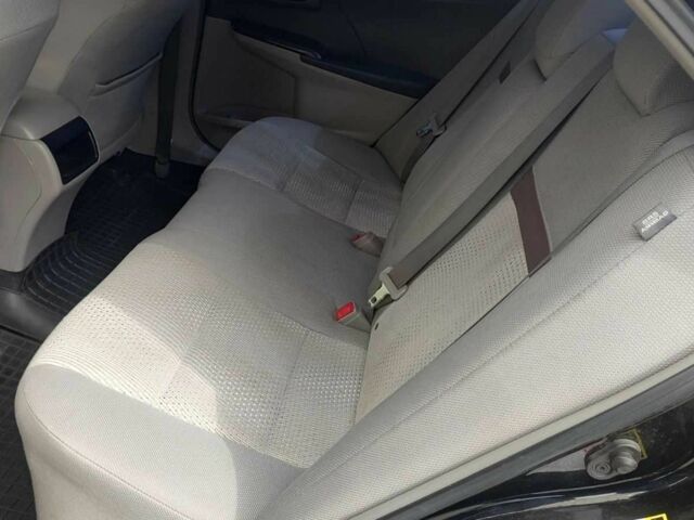 Черный Тойота Камри, объемом двигателя 2.5 л и пробегом 290 тыс. км за 9500 $, фото 15 на Automoto.ua