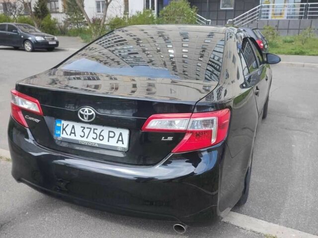 Черный Тойота Камри, объемом двигателя 2.5 л и пробегом 290 тыс. км за 9500 $, фото 1 на Automoto.ua