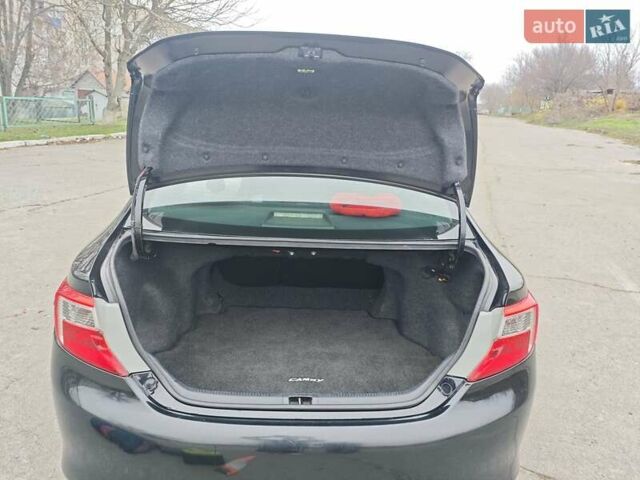 Чорний Тойота Камрі, об'ємом двигуна 2.5 л та пробігом 189 тис. км за 11500 $, фото 3 на Automoto.ua