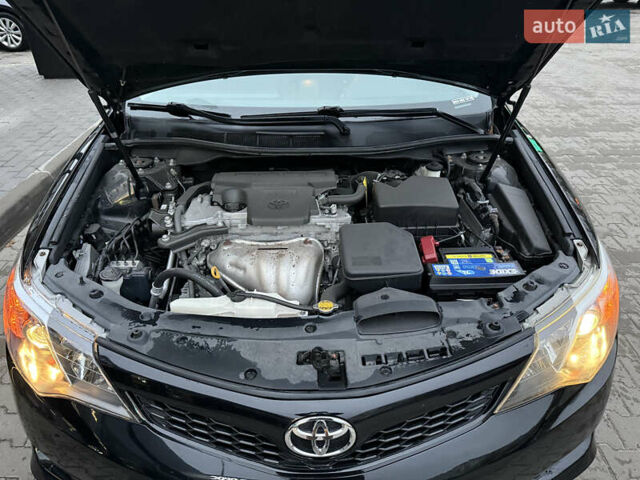Черный Тойота Камри, объемом двигателя 2.49 л и пробегом 230 тыс. км за 13200 $, фото 26 на Automoto.ua