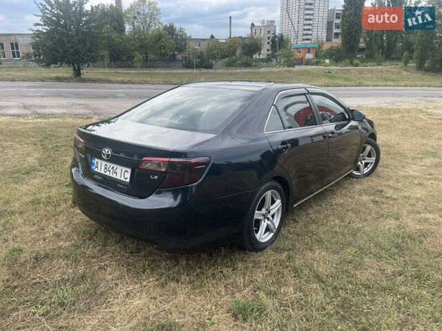 Черный Тойота Камри, объемом двигателя 2.5 л и пробегом 250 тыс. км за 10900 $, фото 3 на Automoto.ua