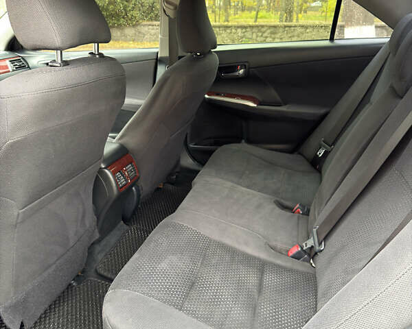 Черный Тойота Камри, объемом двигателя 2.36 л и пробегом 231 тыс. км за 9900 $, фото 14 на Automoto.ua