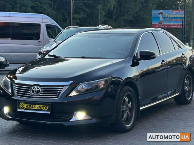 Черный Тойота Камри, объемом двигателя 2.5 л и пробегом 211 тыс. км за 12700 $, фото 2 на Automoto.ua