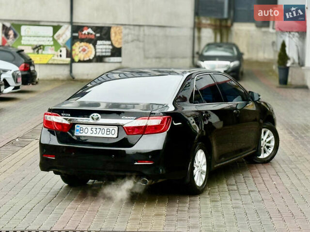 Чорний Тойота Камрі, об'ємом двигуна 2.5 л та пробігом 251 тис. км за 10999 $, фото 25 на Automoto.ua