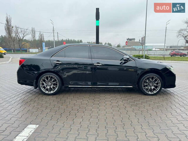 Черный Тойота Камри, объемом двигателя 3.46 л и пробегом 193 тыс. км за 14900 $, фото 14 на Automoto.ua