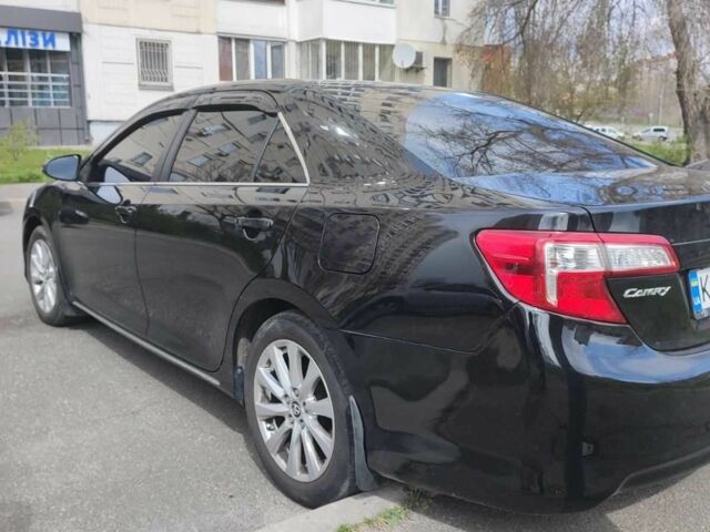 Черный Тойота Камри, объемом двигателя 2.5 л и пробегом 290 тыс. км за 9500 $, фото 17 на Automoto.ua