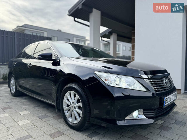 Черный Тойота Камри, объемом двигателя 2.5 л и пробегом 255 тыс. км за 13500 $, фото 16 на Automoto.ua