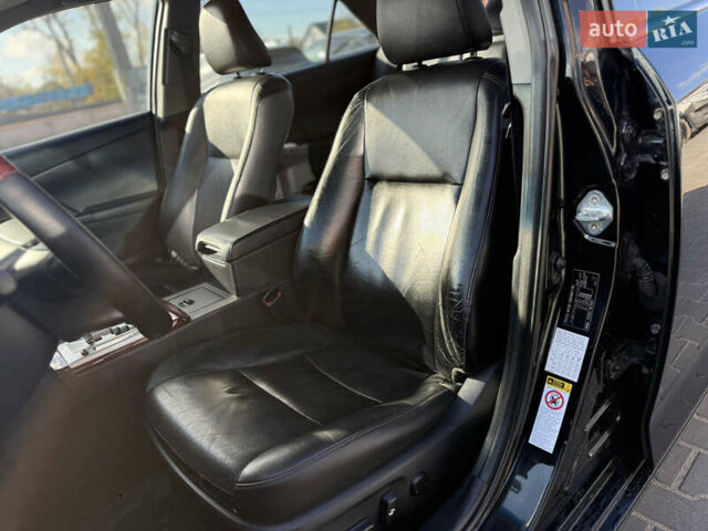 Чорний Тойота Камрі, об'ємом двигуна 2.49 л та пробігом 305 тис. км за 11800 $, фото 16 на Automoto.ua