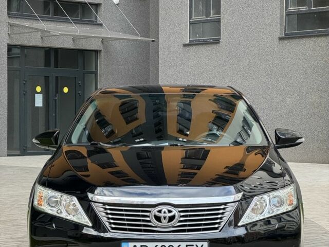 Черный Тойота Камри, объемом двигателя 2.5 л и пробегом 141 тыс. км за 13400 $, фото 1 на Automoto.ua