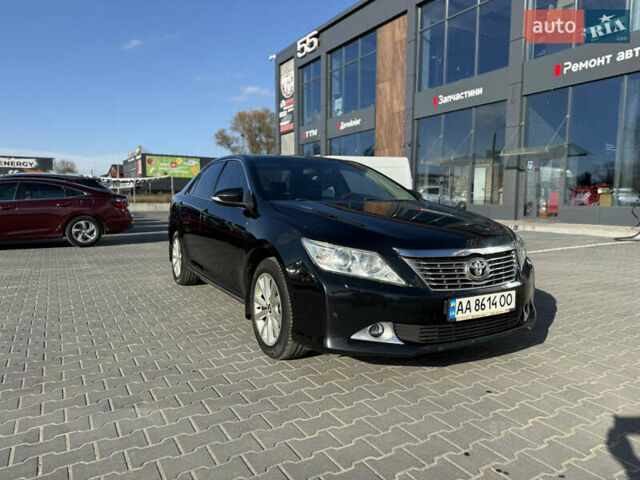 Чорний Тойота Камрі, об'ємом двигуна 2.49 л та пробігом 305 тис. км за 11800 $, фото 2 на Automoto.ua