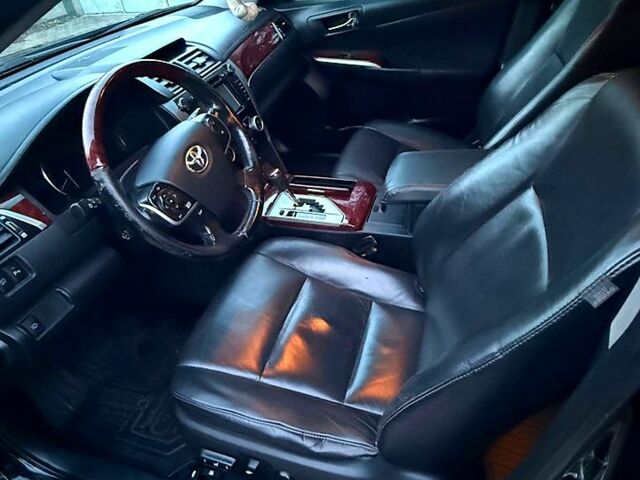 Черный Тойота Камри, объемом двигателя 2.5 л и пробегом 173 тыс. км за 14550 $, фото 3 на Automoto.ua