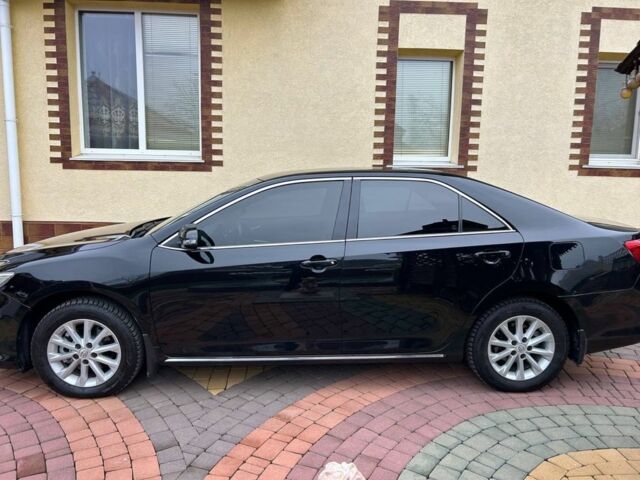 Чорний Тойота Камрі, об'ємом двигуна 2.5 л та пробігом 215 тис. км за 14000 $, фото 2 на Automoto.ua