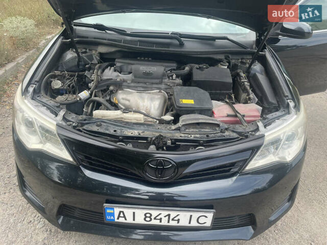 Черный Тойота Камри, объемом двигателя 2.5 л и пробегом 250 тыс. км за 10900 $, фото 6 на Automoto.ua