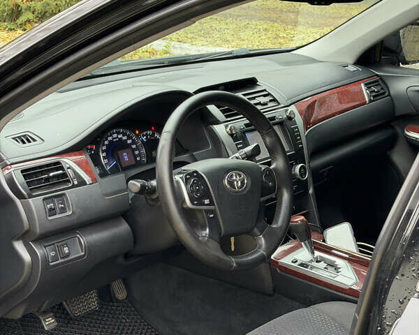 Черный Тойота Камри, объемом двигателя 2.36 л и пробегом 231 тыс. км за 9900 $, фото 10 на Automoto.ua