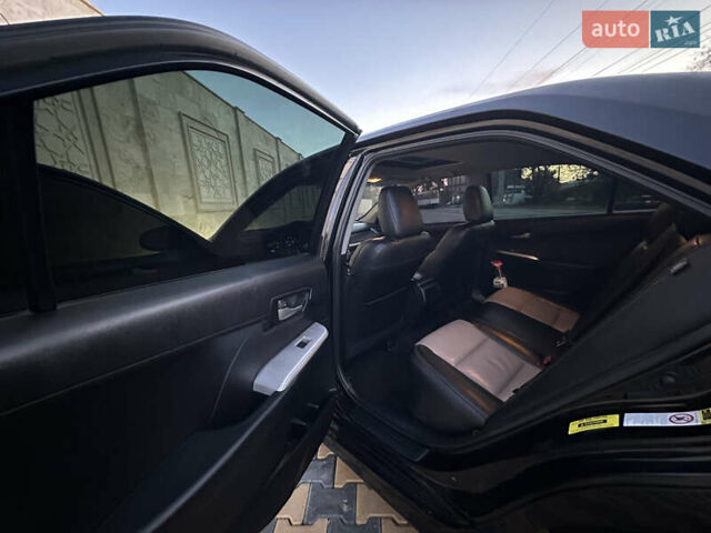 Черный Тойота Камри, объемом двигателя 2.5 л и пробегом 215 тыс. км за 11950 $, фото 26 на Automoto.ua