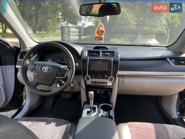 Черный Тойота Камри, объемом двигателя 2.5 л и пробегом 250 тыс. км за 10900 $, фото 8 на Automoto.ua