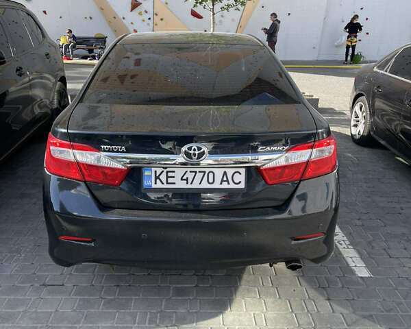 Черный Тойота Камри, объемом двигателя 2.5 л и пробегом 280 тыс. км за 11600 $, фото 2 на Automoto.ua