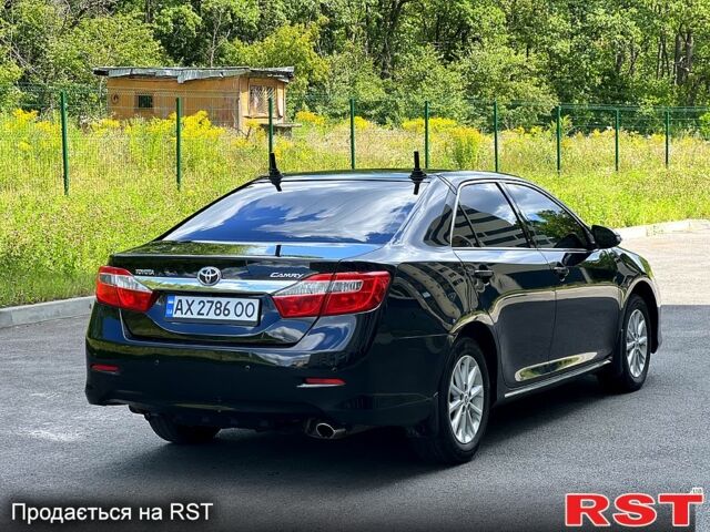 Чорний Тойота Камрі, об'ємом двигуна 2.5 л та пробігом 250 тис. км за 13500 $, фото 3 на Automoto.ua