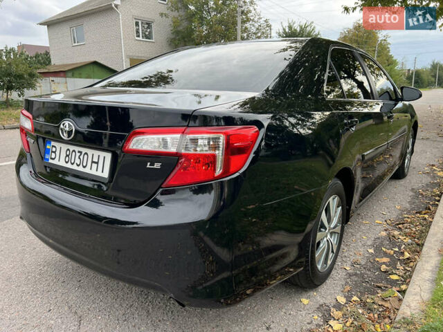 Черный Тойота Камри, объемом двигателя 2.5 л и пробегом 155 тыс. км за 12000 $, фото 2 на Automoto.ua