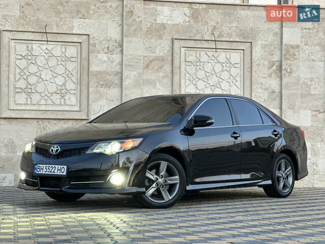 Черный Тойота Камри, объемом двигателя 2.5 л и пробегом 215 тыс. км за 11950 $, фото 6 на Automoto.ua