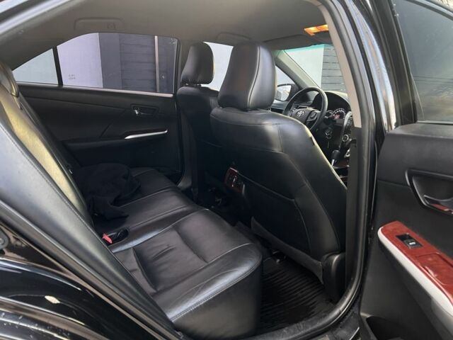 Черный Тойота Камри, объемом двигателя 2.5 л и пробегом 235 тыс. км за 10200 $, фото 7 на Automoto.ua