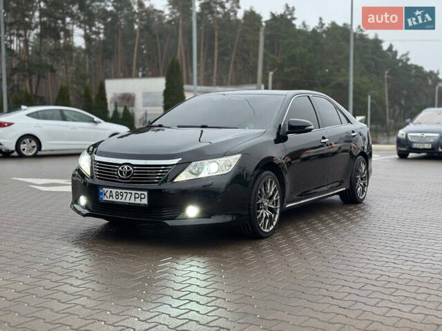 Черный Тойота Камри, объемом двигателя 3.46 л и пробегом 193 тыс. км за 14900 $, фото 1 на Automoto.ua