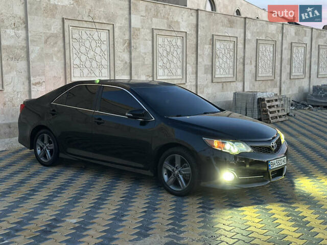 Черный Тойота Камри, объемом двигателя 2.5 л и пробегом 215 тыс. км за 11950 $, фото 22 на Automoto.ua