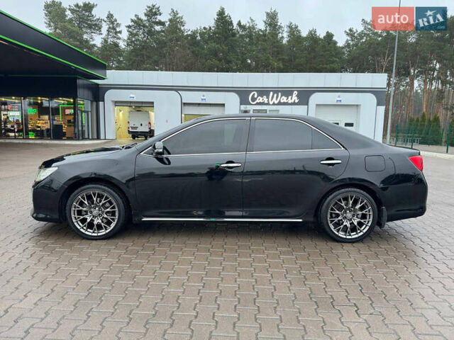 Черный Тойота Камри, объемом двигателя 3.46 л и пробегом 193 тыс. км за 14900 $, фото 22 на Automoto.ua