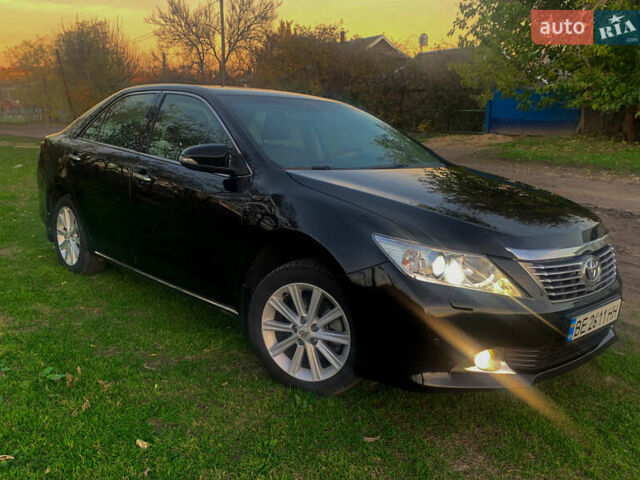 Чорний Тойота Камрі, об'ємом двигуна 2.5 л та пробігом 236 тис. км за 15200 $, фото 1 на Automoto.ua