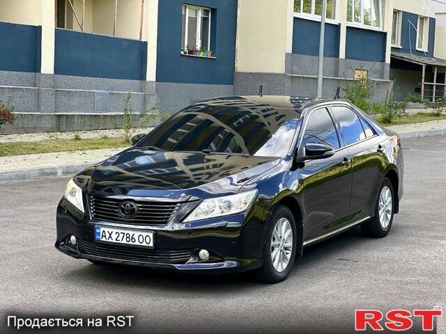 Чорний Тойота Камрі, об'ємом двигуна 2.5 л та пробігом 250 тис. км за 13500 $, фото 1 на Automoto.ua