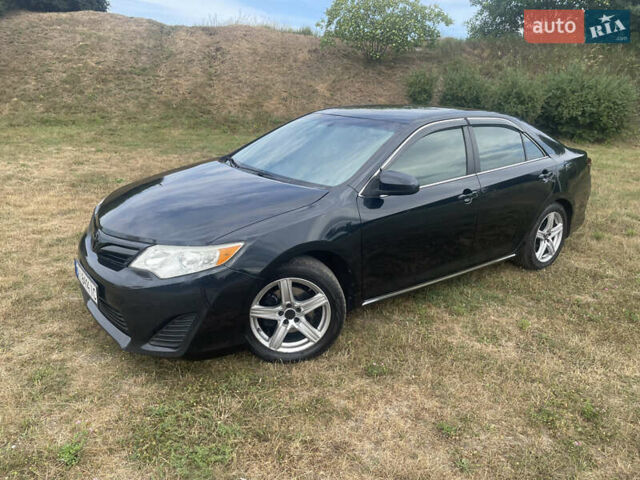 Черный Тойота Камри, объемом двигателя 2.5 л и пробегом 250 тыс. км за 10900 $, фото 5 на Automoto.ua