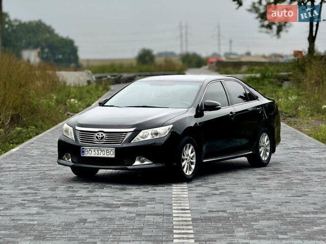 Черный Тойота Камри, объемом двигателя 2.5 л и пробегом 260 тыс. км за 10999 $, фото 10 на Automoto.ua