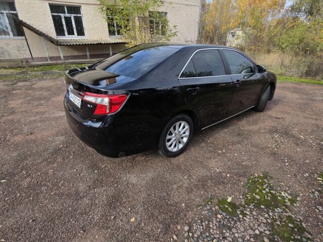 Чорний Тойота Камрі, об'ємом двигуна 2.5 л та пробігом 230 тис. км за 9999 $, фото 2 на Automoto.ua