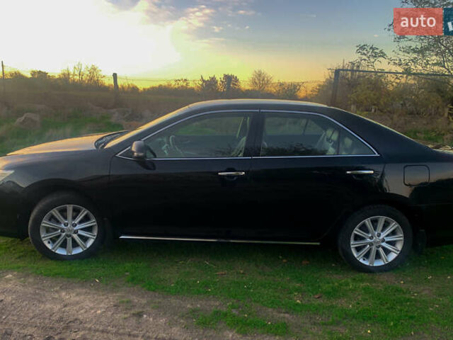 Чорний Тойота Камрі, об'ємом двигуна 2.5 л та пробігом 236 тис. км за 15200 $, фото 3 на Automoto.ua